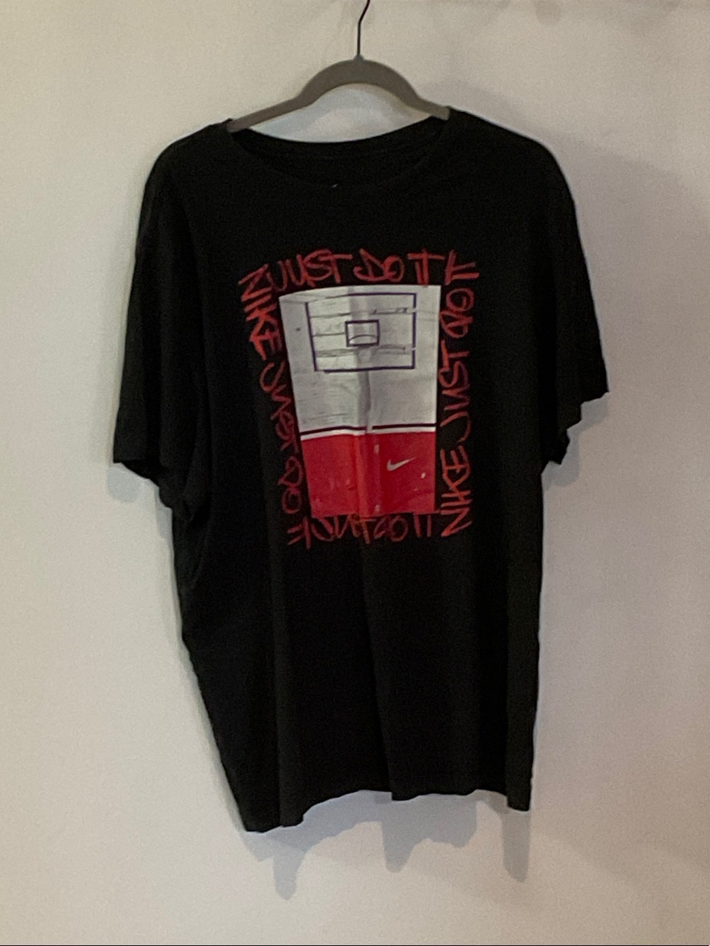 Nike Men’s Black Tee with Red and White Basketball Graphic